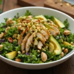 A colorful bowl of Gwyneth Paltrow's chopped salad with fresh ingredients.