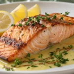 Pan-seared salmon with crispy skin and lemon butter drizzle