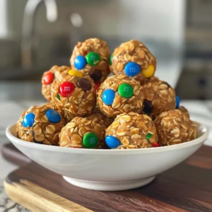 Bowl of no-bake energy bites with M&Ms.